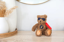 Load image into Gallery viewer, Personalised Alimrose Super Hero Ted 29cm sitting on shelf