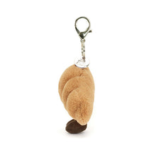 Load image into Gallery viewer, Jellycat Amuseables Croissant Bag Charm Plush croissant-shaped keychain with a smiling face on a white background side