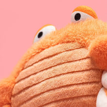 Load image into Gallery viewer, Jellycat Pinchsnap Crab Close-up of a plush toy with a pink background