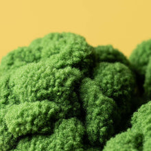 Load image into Gallery viewer, Jellycat Amuseables broccoli Close-up of green textured yarn on a yellow background
