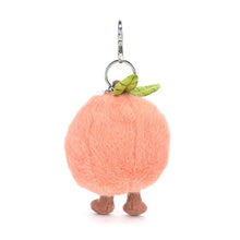 Load image into Gallery viewer, Jellycat Amuseables Peach-shaped keychain with legs and a leaf on a white background
