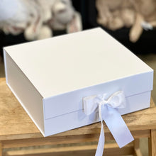 Load image into Gallery viewer, New Baby Gift Box - Pink with swaddle, jellycat bunny, rubber dummies and beechwood teether presented in a white box with bow
