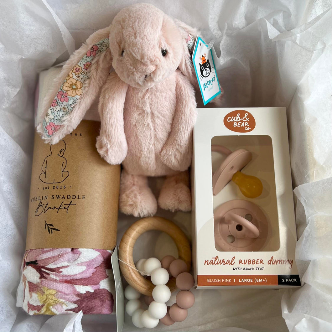 New Baby Gift Box - Pink with swaddle, jellycat bunny, rubber dummies and beechwood teether presented in a white box with bow